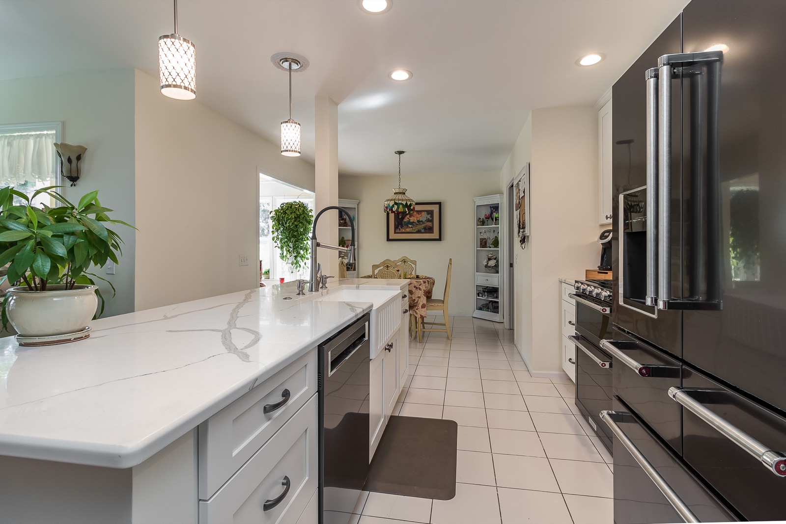Completed Aurora kitchen renovation — Island looking toward the dining area