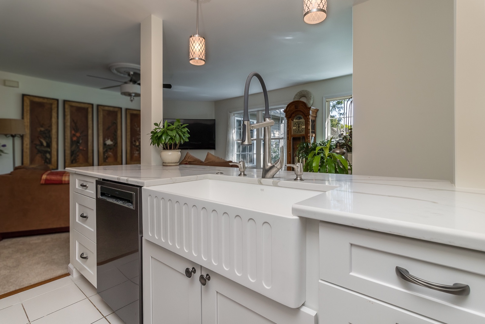 Completed Aurora kitchen renovation — Farmhouse sink and pendant lighting