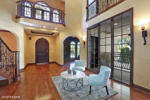 Hinsdale custom home — Foyer seating and balcony detail