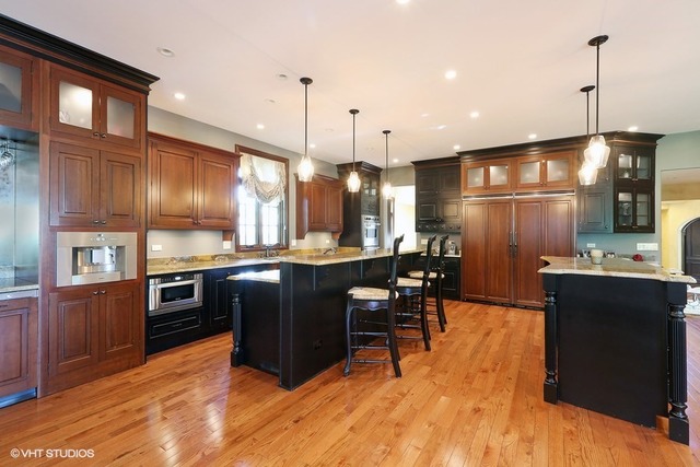 Hinsdale custom home — Custom kitchen cabinetry and islands