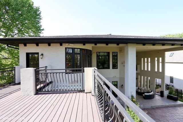 Hinsdale custom home — Upper balcony and covered outdoor spaces