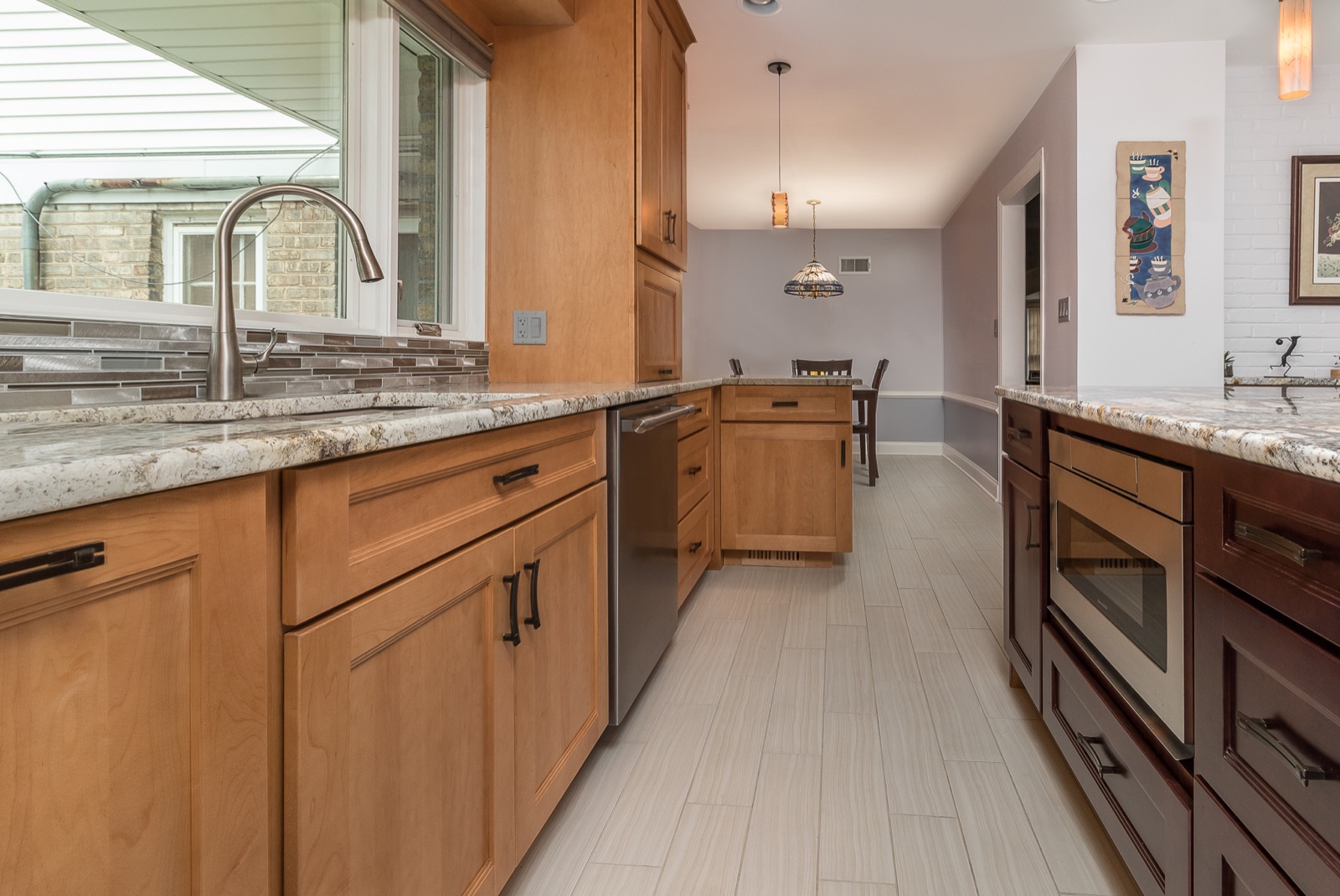 Completed Lincolnwood kitchen renovation — Sink and galley view