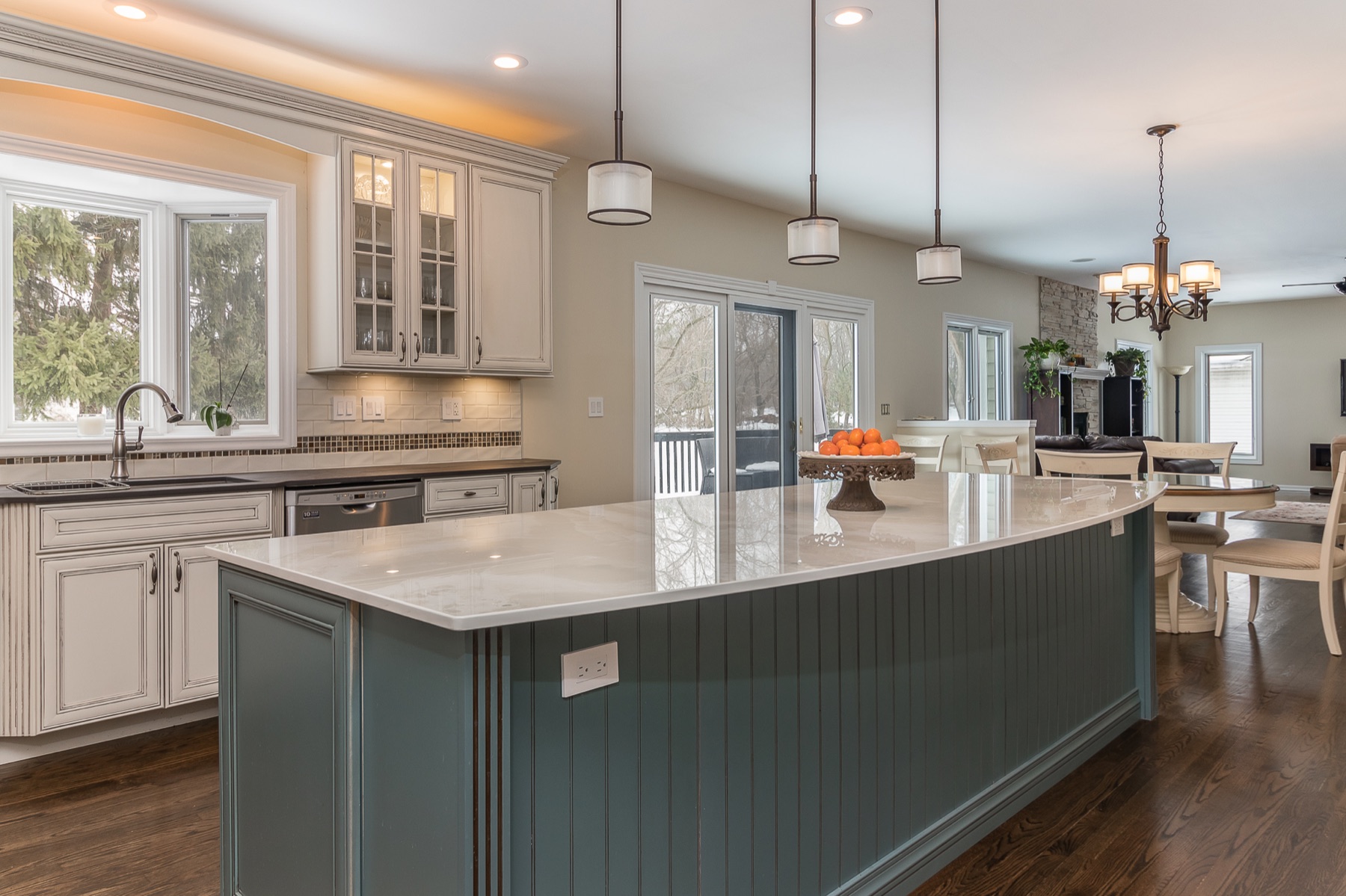 Completed Lombard renovation — Kitchen island overlooking the living area